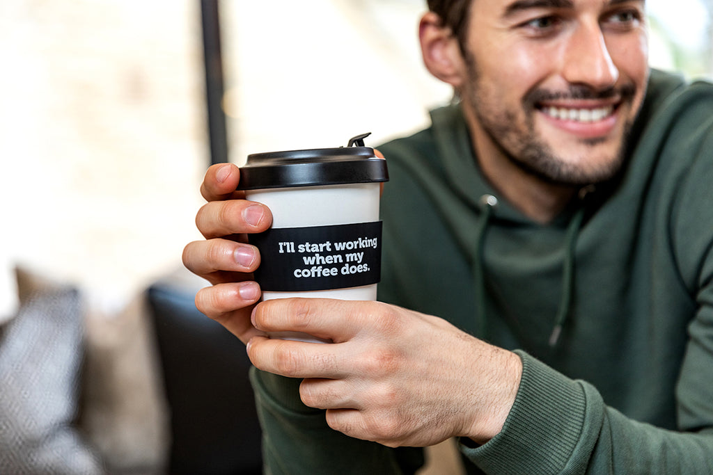 AIM2Flourish  Keep Your Coffee Cup, Reuse It